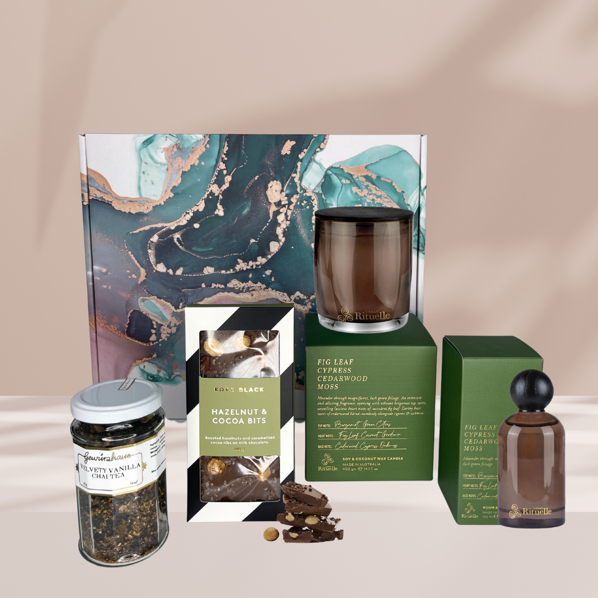 Christmas Hamper Box with Urban Rituelle Fig and Cypress Candle, Urban Rituelle Fig and Cypress Mist, Koko Black Hazelnut Chocolate Block and Gewürzhaus Velvety Vanilla Chai.
