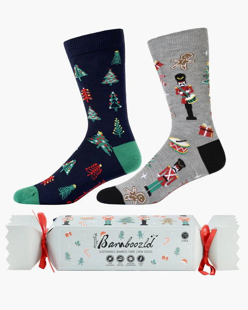 Two pairs of Christmas-themed socks with a cracker and 'Bamboost' branding.
