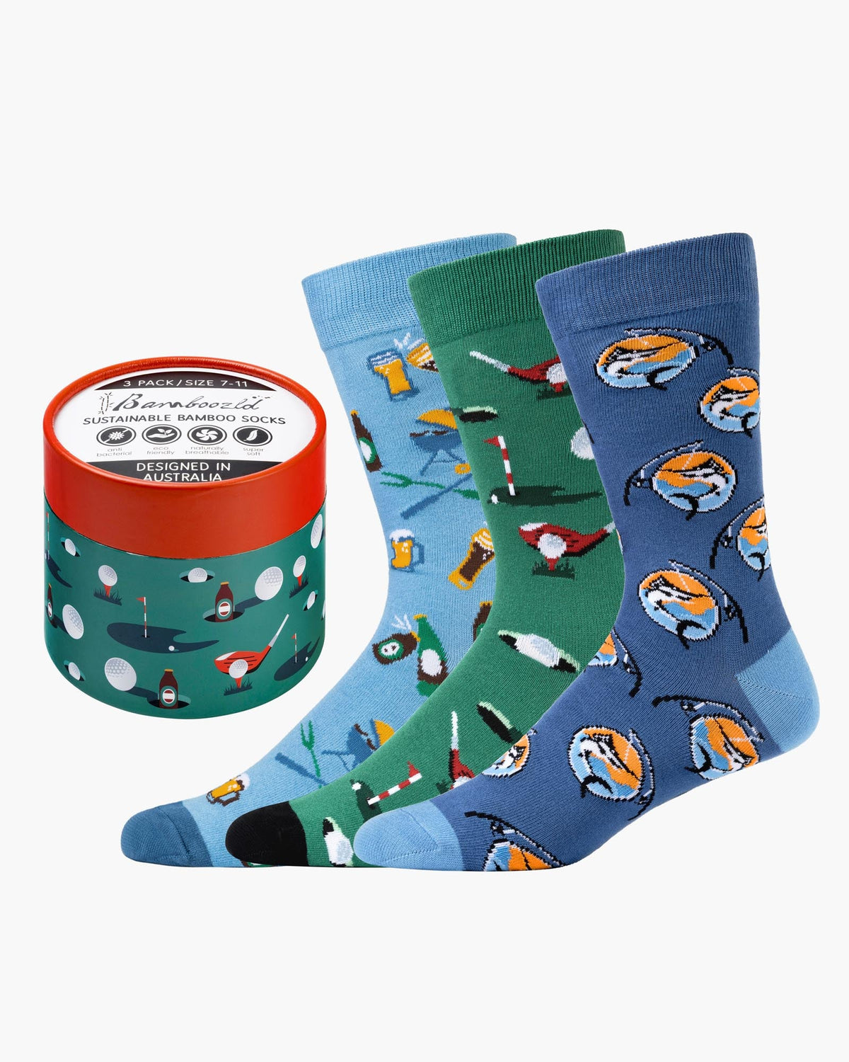 Three pairs of patterned socks with a container labeled 'Barbican' on a white background