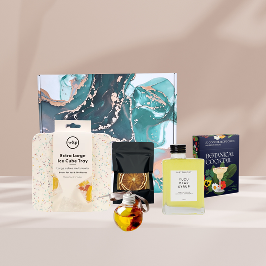 Cheers To The Holidays ; Christmas Hamper Box with Botanical Cocktail Deck, W&P Square Ice Mould, Triffid Dried Blood Orange Cocktail Slices, Gin Bauble and Tasteology Yuzu & Pear Syrup.