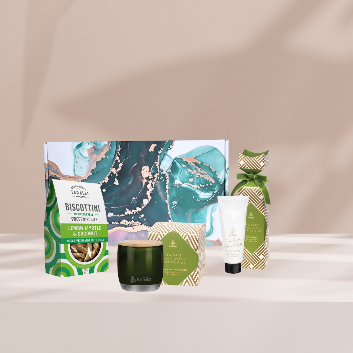 A Merry Myrtle Christmas gift hamper featuring an Urban Rituelle Lemon Myrtle candle, matching lemon myrtle hand cream and Biscottini lemon myrtle biscuits
