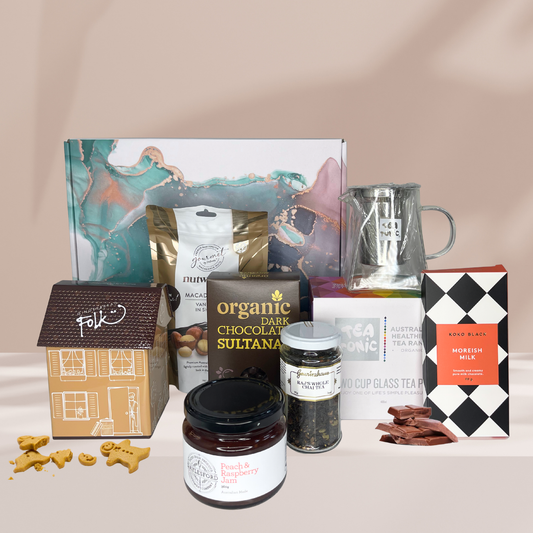 Christmas Hamper Box with Two Cup Teapot, Chocolate Sultanas, Koko Black Milk Chocolate Block, Folk Gingerbread Tin, Artisan Jam, Vanilla Macadamias and Gewürzhaus Raj's Chai.