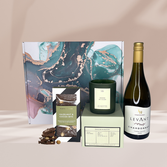 Keep Christmas gifting classic with Levantine Hill Chardonnay, a luxury Studio McKenna candle and indulgent Koko Black hazelnut chocolate.