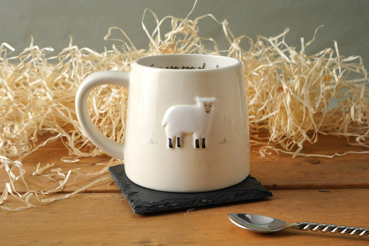 White mug with sheep design
